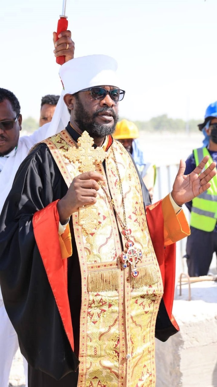 Church leader holding cross